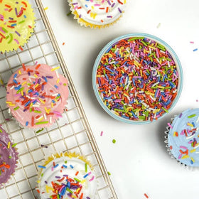 A Great Surprise sprinkles on cookies for eye-catching toppers