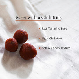 A Mi Gusto Natural tamarind candy texture close-up, chewy and tangy.