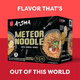Steam rises from A-Sha Meteor Noodle in a bowl ready for dinner.
