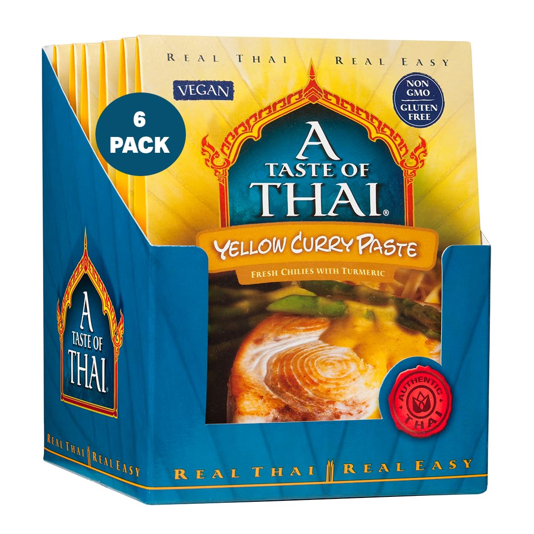 A Taste of Thai Yellow Curry Paste bottle with vibrant golden color for quick curries.