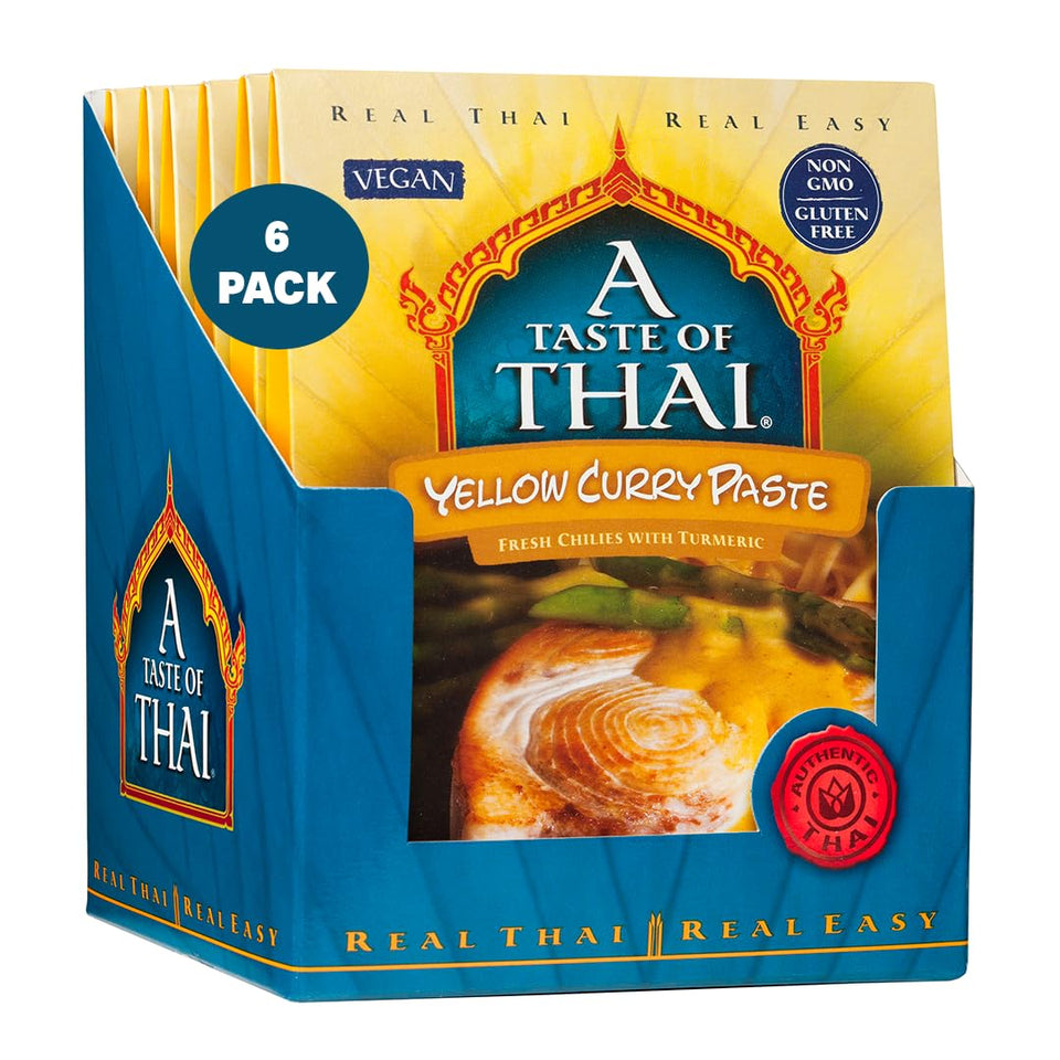A Taste of Thai Yellow Curry Paste bottle with vibrant golden color for quick curries.