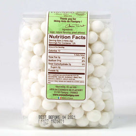 Abbaye de Flavigny anise drops close-up showing sugar-coated grains for a fragrant pick-me-up.