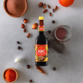 ABC Indonesian Sweet Soy Sauce bottle against label hints Indonesian heritage and quality.