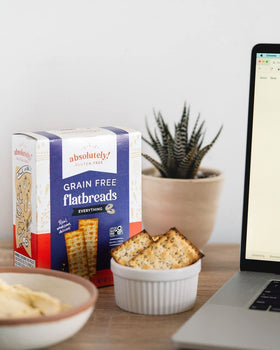 Absolutely Gluten Free Everything Flatbread slice stack conveys versatile snacking and layering possibilities.
