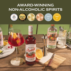 Pouring Abstinence Blood Orange Aperitif into a glass for spritz.