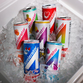 Cold can pouring into a glass of Accelerator Island Guava, zero sugar option.