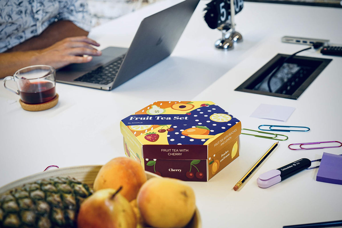 ACORUS fruit tea bags close-up, vivid textures and natural ingredients.
