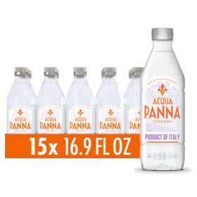 Acqua Panna bottle being poured, clean hydration for meals and refined dining