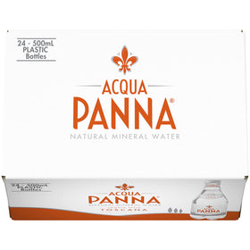 Acqua Panna bottle on a dining setting complements wine pairing.