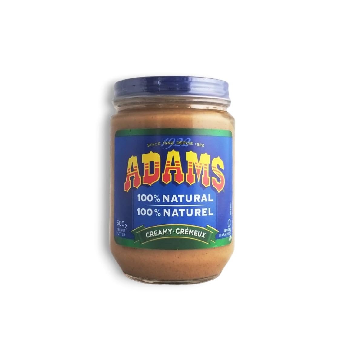 Close-up of ADAMS Creamy Peanut Butter texture in glass jar