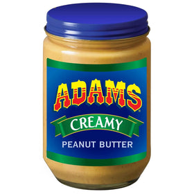 ADAMS Creamy Peanut Butter jar with smooth spread on toast