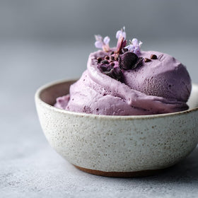 Addictive Wellness Purple Cacao Powder Arriba Nacional beans concept image