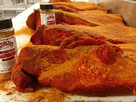 Adkins rub on pork ribs for rich, smoky flavor.