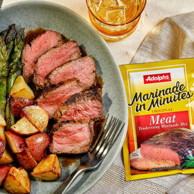 Lamb slices marinated with Adolph's gain tender, flavorful results