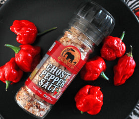 African Dream Foods Ghost Pepper Salt sprinkled on roasted meat for heat.