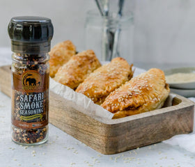 African Dream Foods Safari Smoke Seasoning in-use shot with seasoned vegetables and meat.
