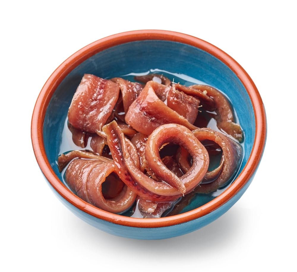 Agostino Recca anchovies-olive-oil-glass-bottle emphasizes shelf-stable convenience for home cooks.