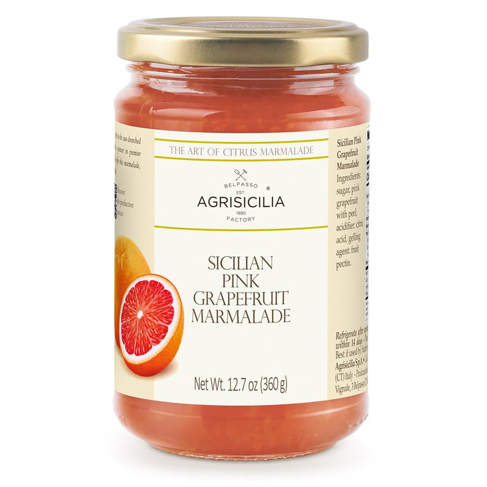Agrisicilia pink grapefruit marmalade in a glass jar, perfect for toast and breakfast brightness.