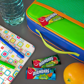 Airheads Blue Blast candy, vibrant blue flavor bursts.