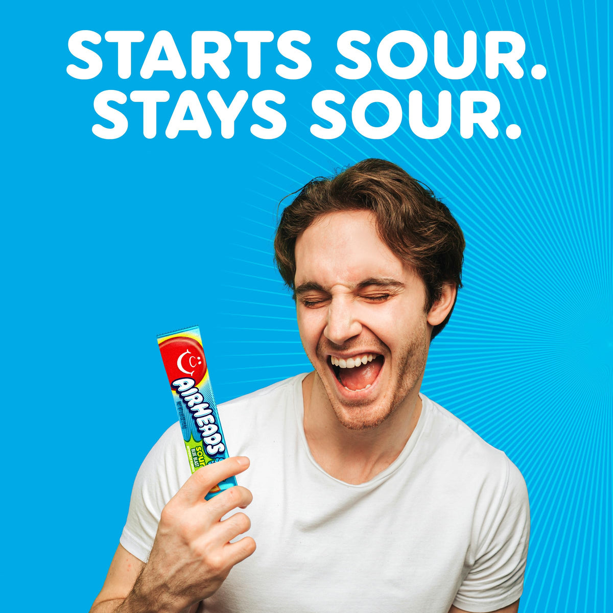 Airheads Sour Blue Blast bars on a concession-stand display, great for events.