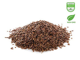 Pouring AIVA flax seeds from a measuring cup to boost smoothies with texture.