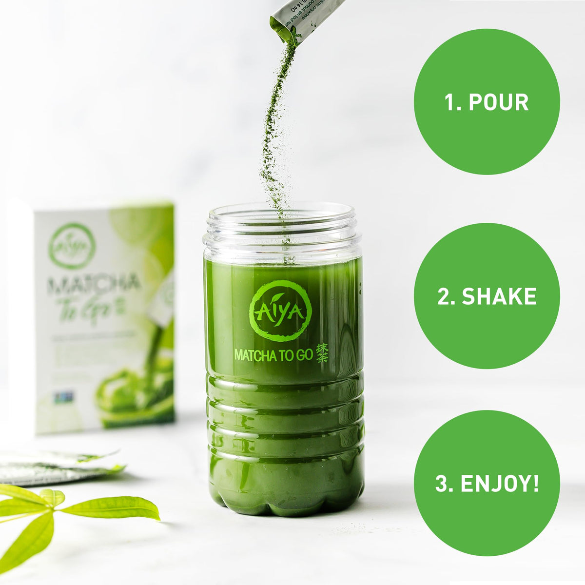 AIYA Matcha To Go ceremonial-grade powder close-up highlights vibrant green color.
