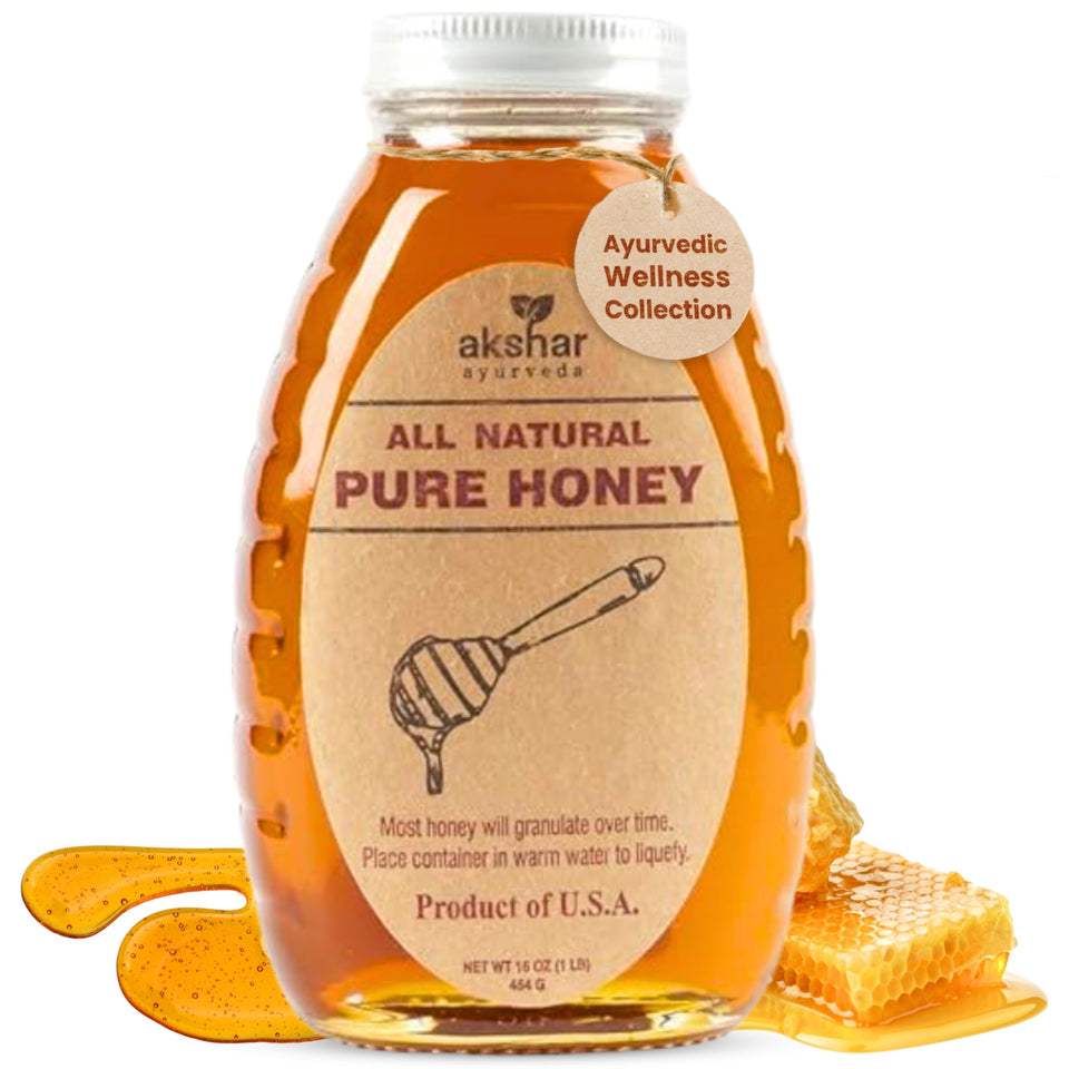 AKSHAR Ayurveda Pure Honey in a glass jar with a smooth pour for everyday sweetness.