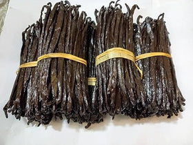 Akshit vanilla beans plump dark brown pods show rich aroma for baking