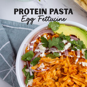 AL DENTE Protein Pasta Egg Fettuccine plated with sauce demonstrates versatile serving options.
