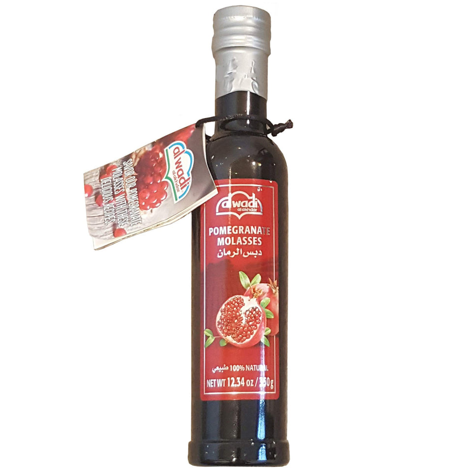 Al Wadi Pomegranate Molasses bottle with rich amber color for tangy glaze and vinaigrette