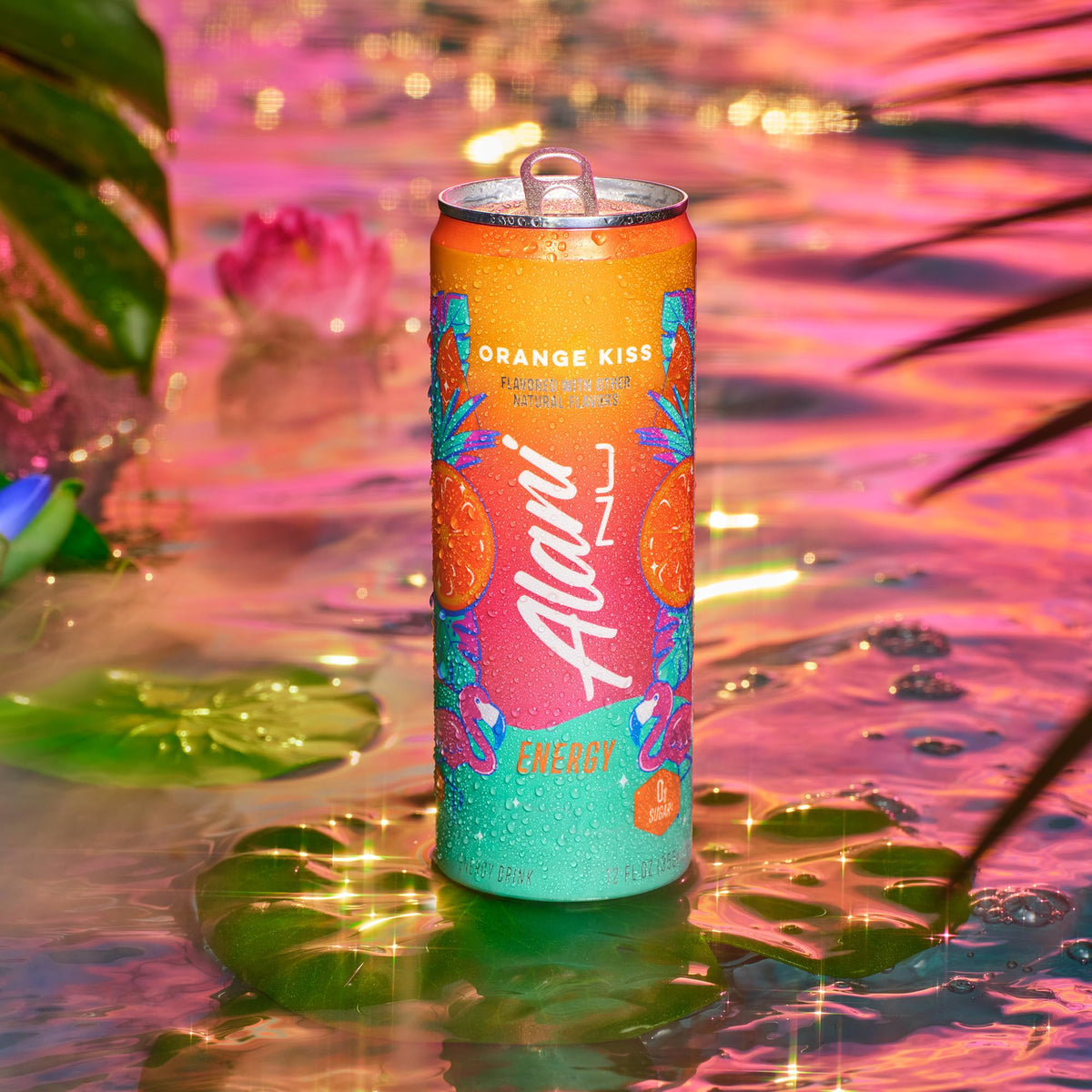 Alani Nu ORANGE KISS fizz closeup shows refreshing bubbles for a lively sip.