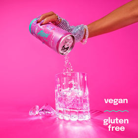 Alani Nu Pink Slush being poured for a refreshing flavor moment.