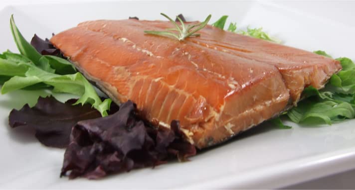 Alaska Smokehouse alder-smoked salmon close-up, showcases delicate texture and natural color.