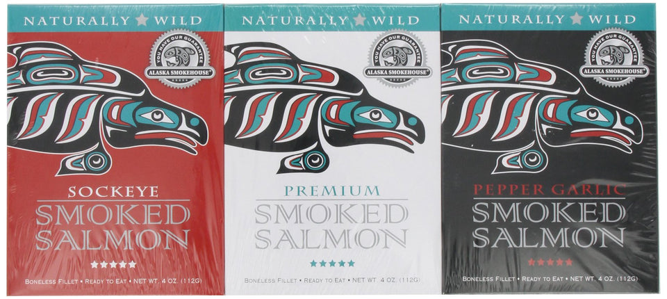 Alaska Smokehouse Trio sampler pack with natural, pepper garlic, and sockeye salmon, ideal gift.