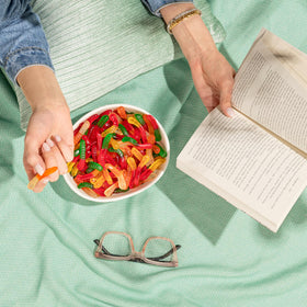 Serving bowl of Albanese gummy worms for snacking and sharing.