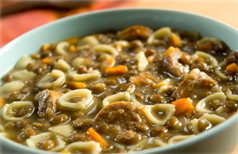 Serving Alessi Autentico Sicilian Lentil soup with crusty bread and aroma