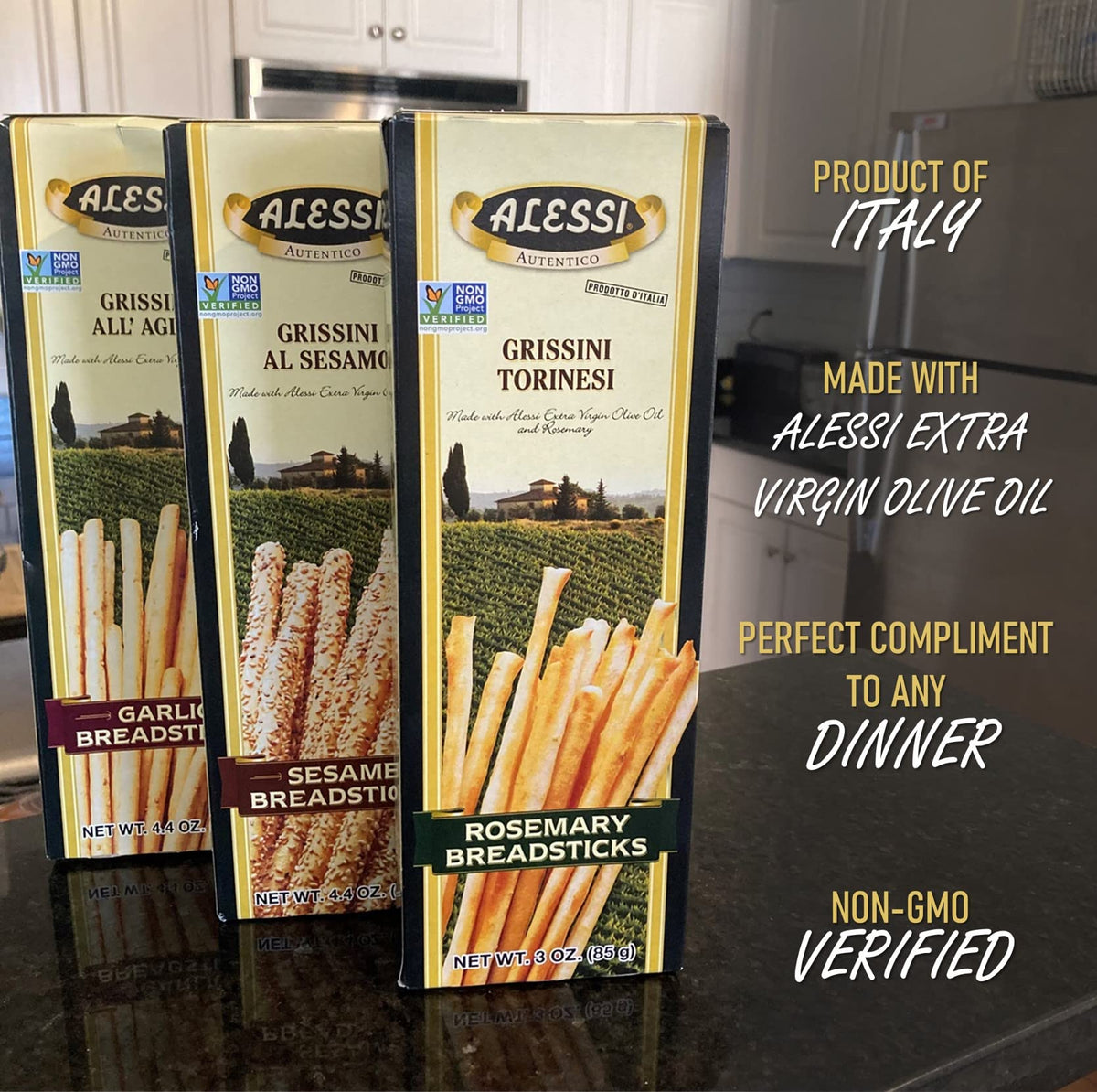 Alessi Sesame Breadsticks boxes opened to reveal thin sesame sticks.