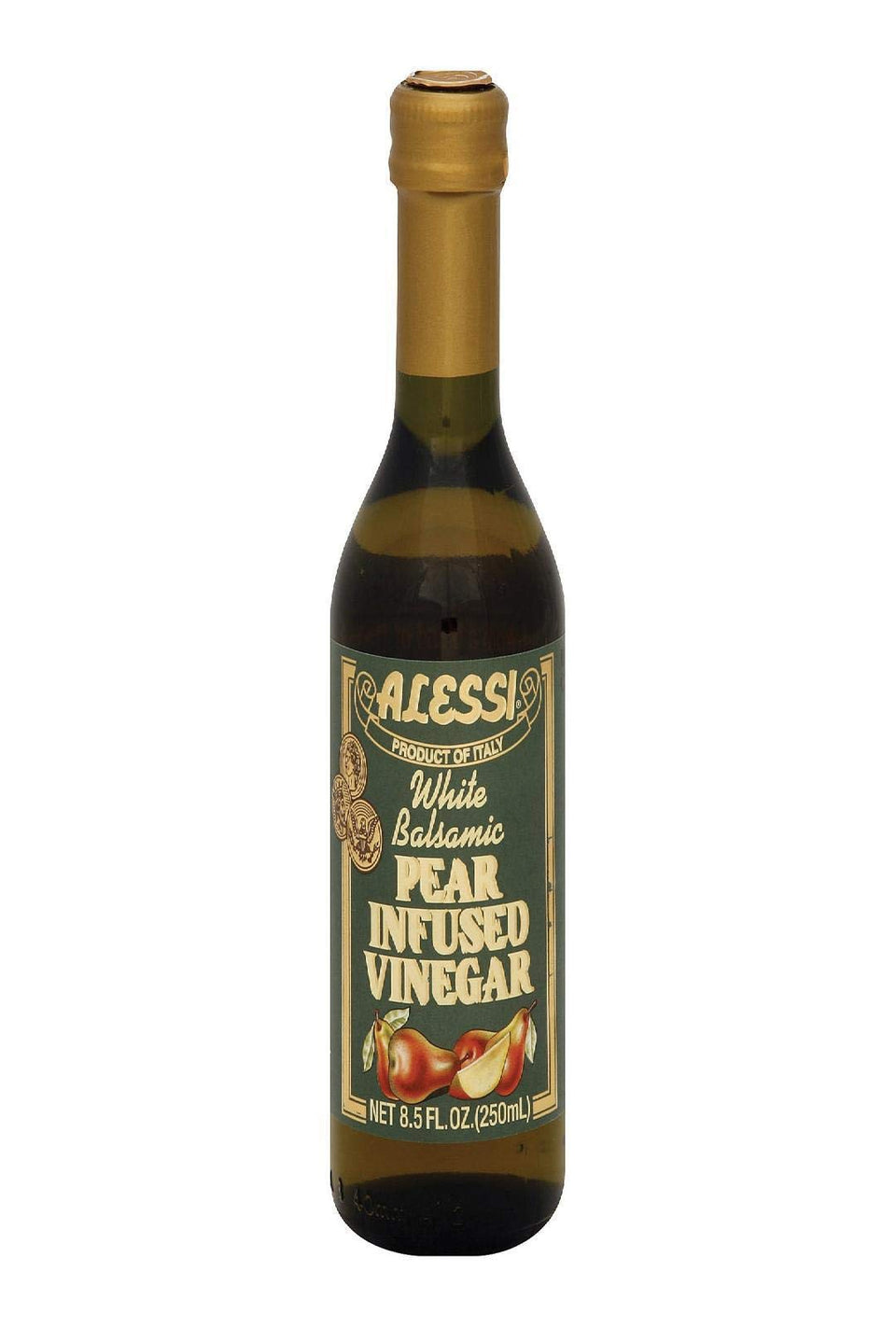 Alessi balsamic pear vinegar bottle pouring over a fresh salad.
