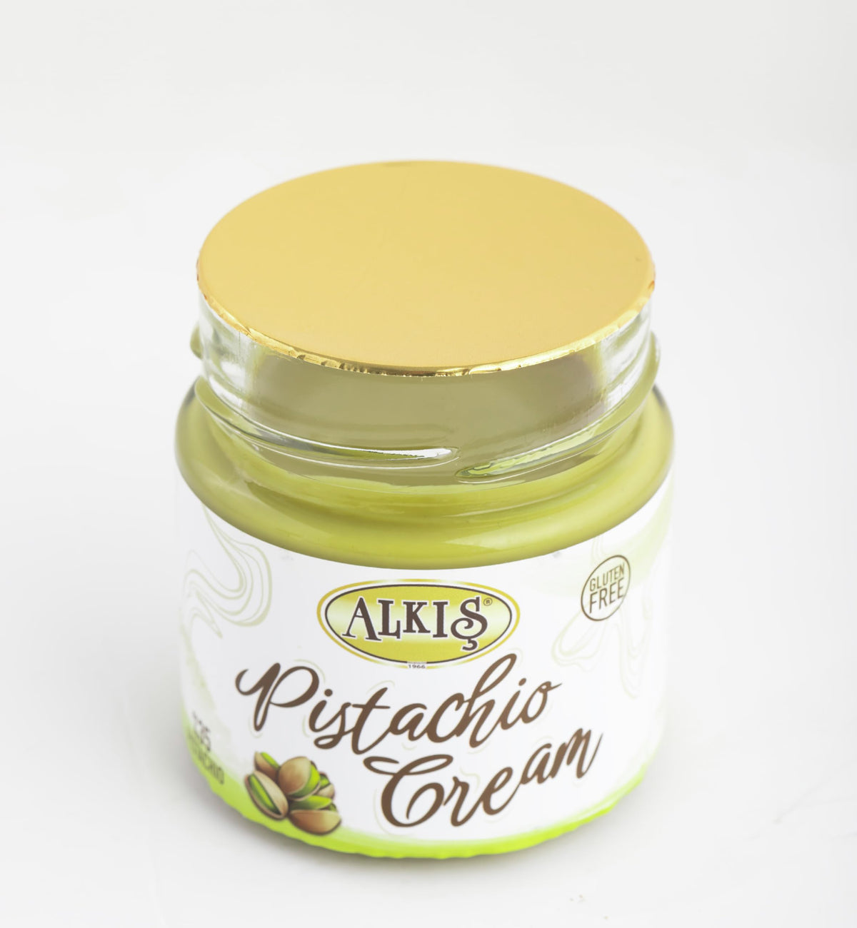 Alkis Pistachio Cream in glass jar highlights natural, additive-free pistachio goodness.
