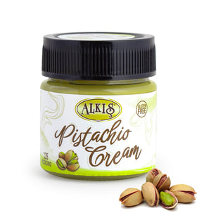 Alkis Pistachio Cream jar on a wooden board, rich flavor ready for dessert spreads.