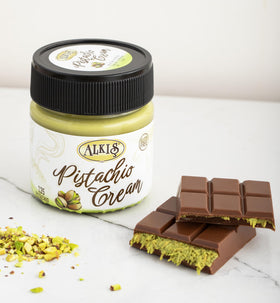 Alkis pistachio cream topping on ice cream highlights indulgent, scoopable texture.
