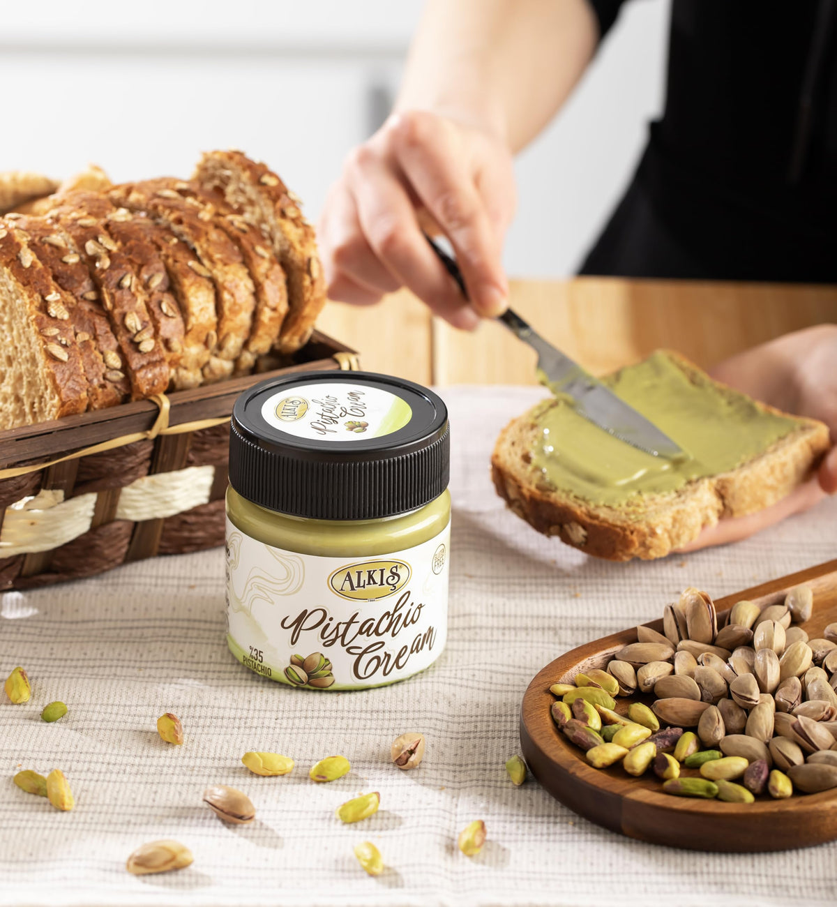 Alkis Turkish pistachios in shell showcase quality ingredients behind the spread.
