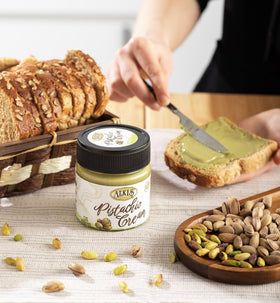 Alkis Turkish pistachios in shell showcase quality ingredients behind the spread.