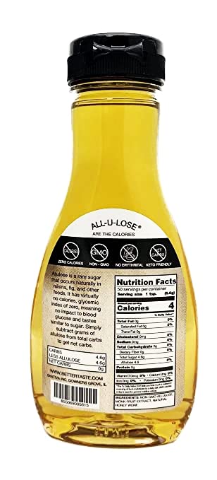 All-u-Lose BetterTaste Honey Syrup being poured onto pancakes showing versatile non-GMO sweetness