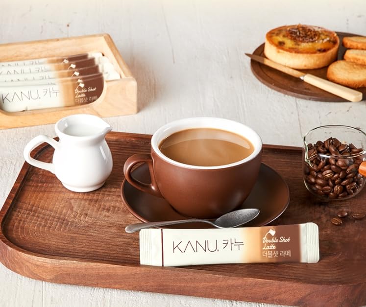 Alliving Kanu latte cup with foam showcasing the smooth sweetness.