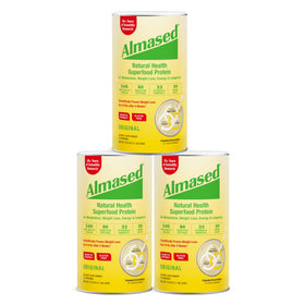 Almased original flavor shake poured into a glass for a quick meal replacement.