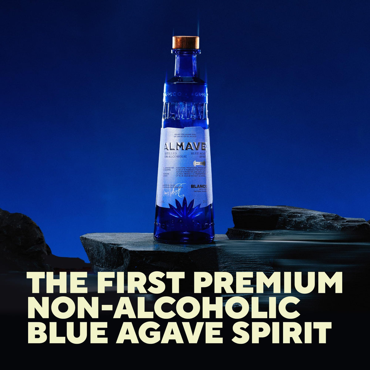 ALMAVE Blanco bottle being poured, ideal for tequila-inspired mocktails.