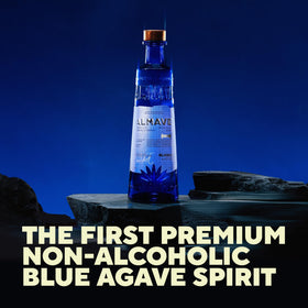 ALMAVE Blanco bottle being poured, ideal for tequila-inspired mocktails.