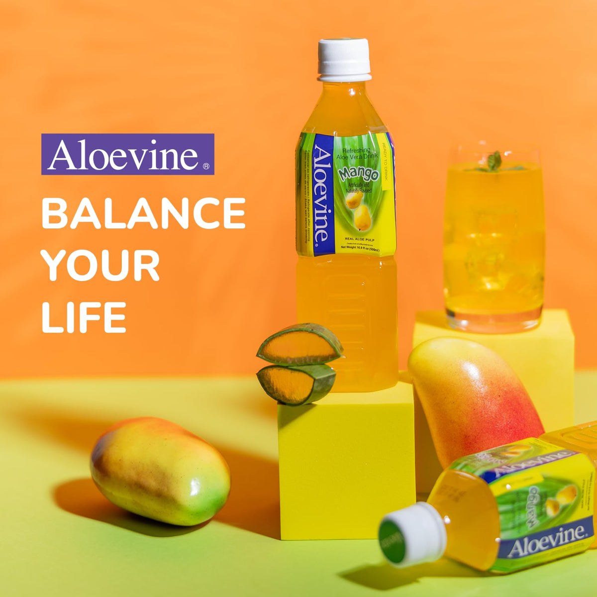 Aloevine mango aloe vera pulp in glass for tropical hydration.