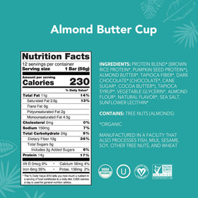ALOHA bar close-up with creamy almond butter and dark chocolate chips texture.